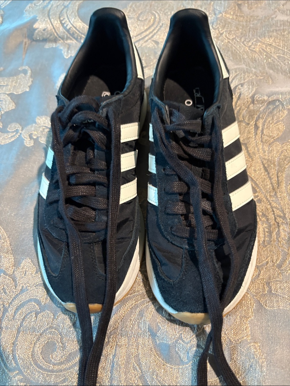 Woman’s Adidas Black Sneakers with White Stripes